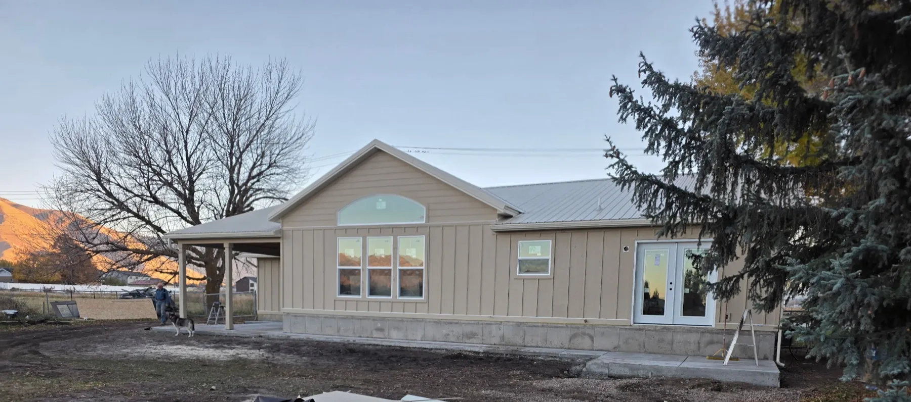 Finished 1,000 sq ft home addition with board and batten siding in Nibley, UT